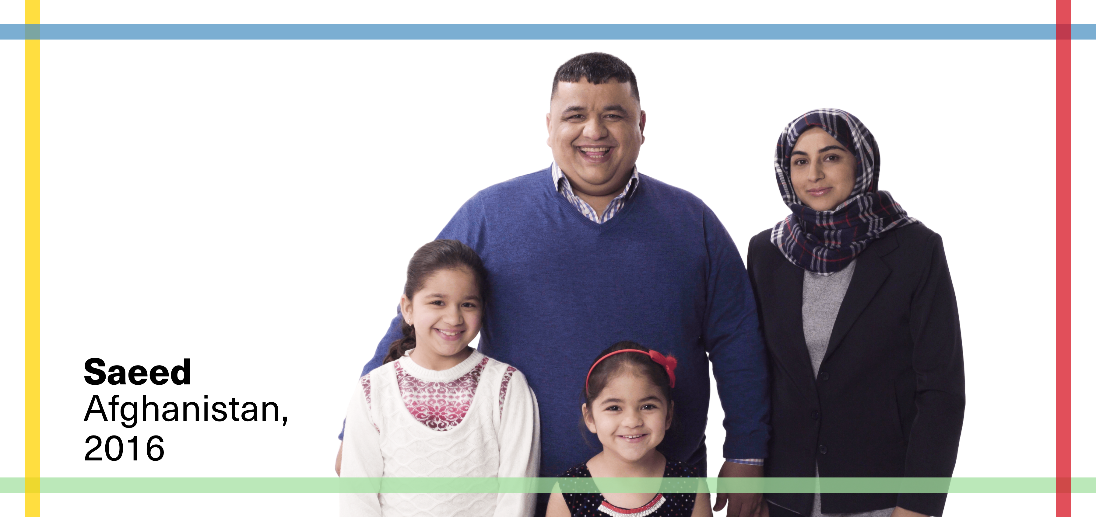 Saeed with his wife and two daughters. All are smiling, especially Saeed.