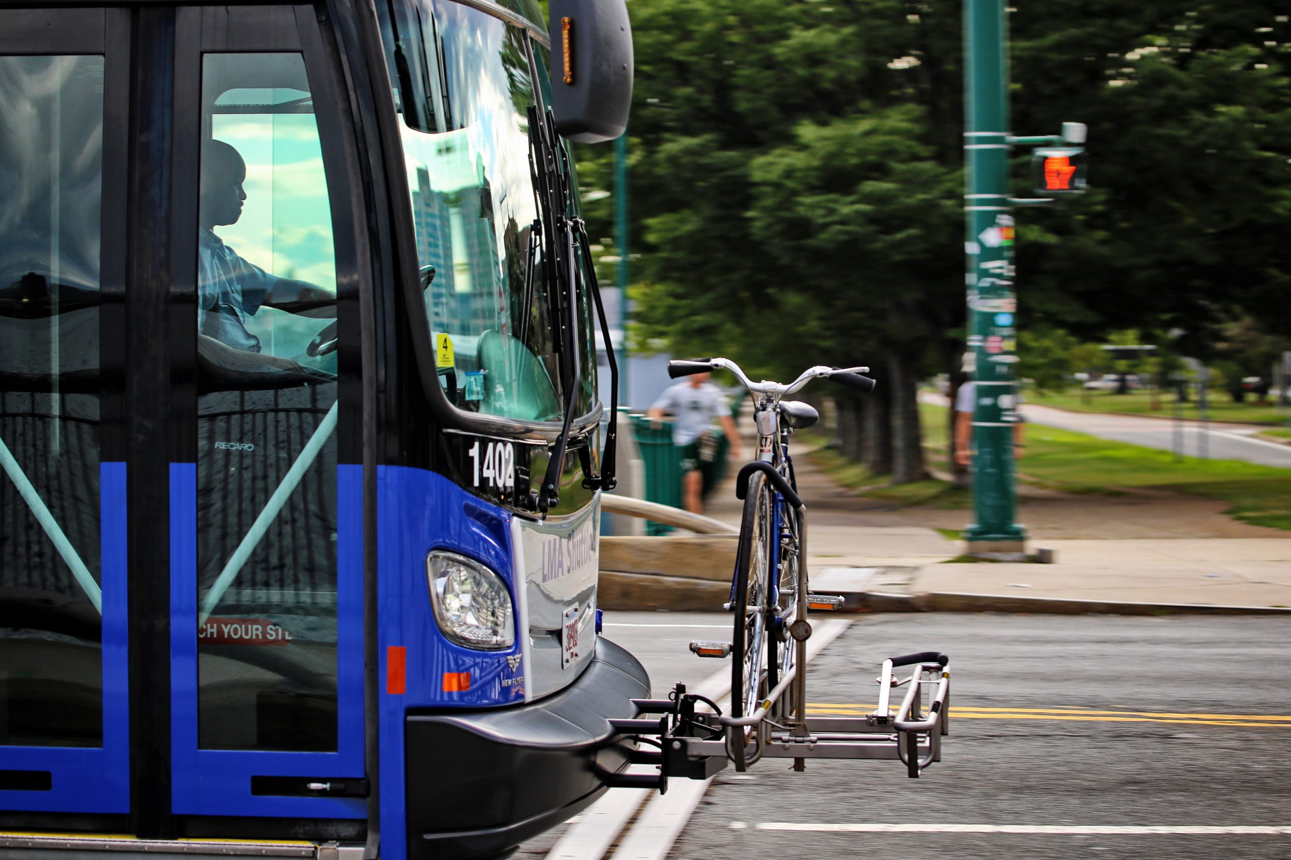 A bike rack on the front of a bus.