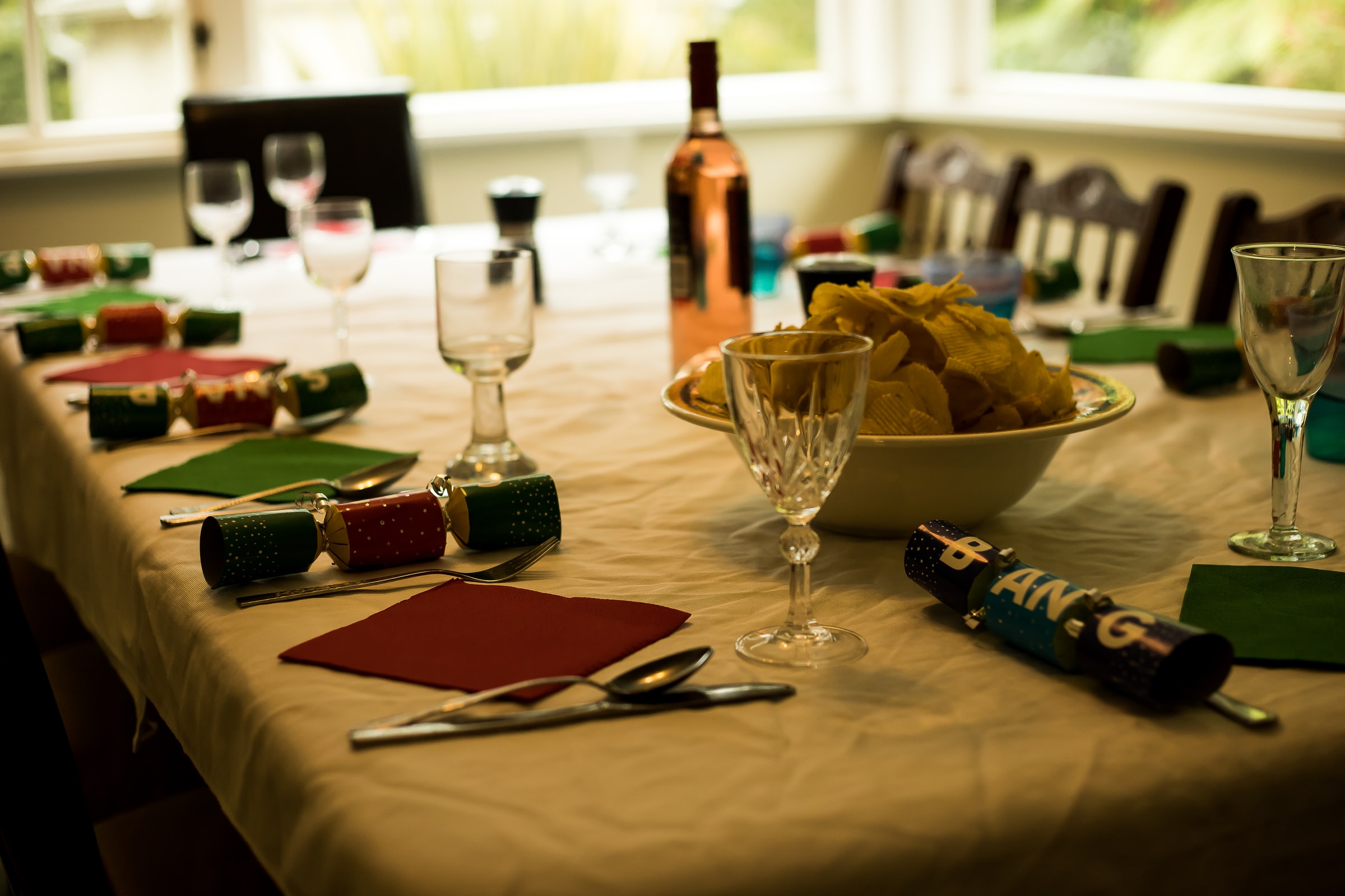 Christmas Crackers set at a dinner table